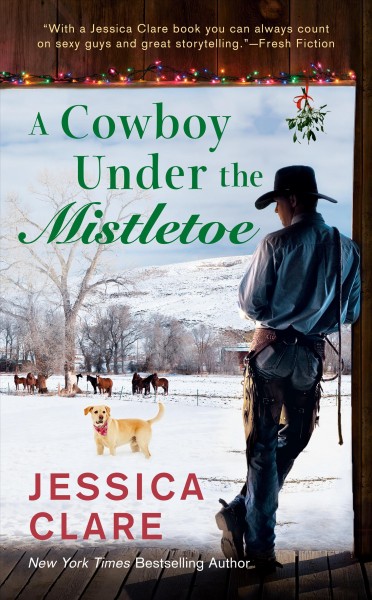 A cowboy under the mistletoe / Jessica Clare.